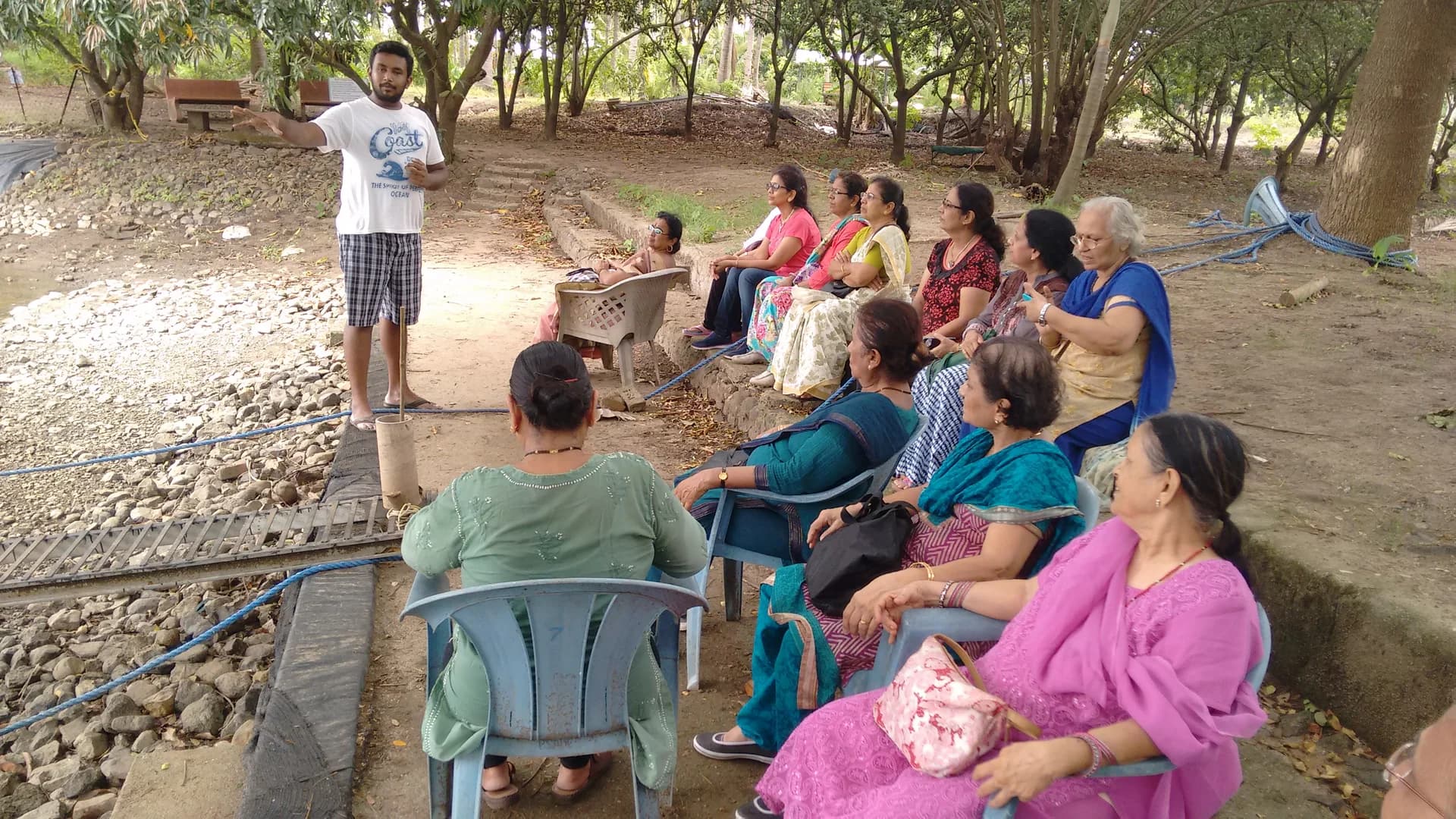 Ladies group enjoying a guided farm tour under chikoo trees at Save Farm Dahanu near Mumbai